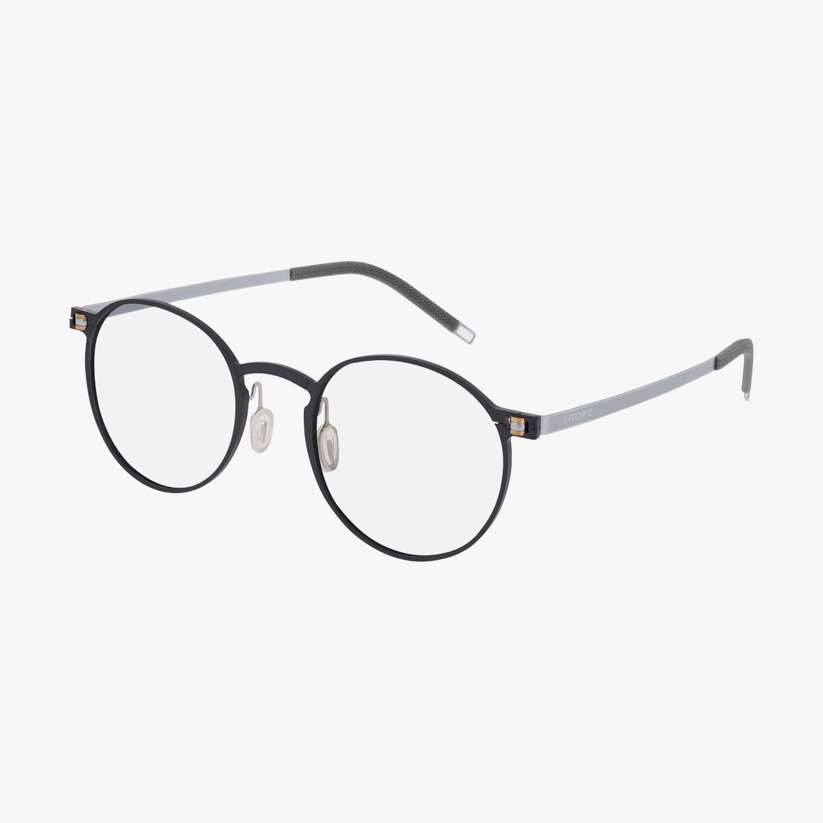 Lunettes Multi-Vision™ TROPZ N°11 en titane, monture ronde ultra légère avec branches flexibles et filtre anti-lumière bleue.
TROPZ N°11 titanium Multi-Vision™ glasses, ultra-lightweight round frame with flexible hinges and blue light filter.